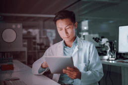 healthcare professional looking at tablet