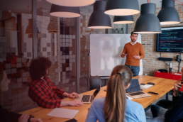 business leader speaking to employees